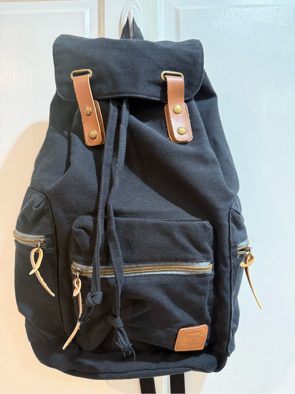 Women's Black Canvas Backpack with Tan Trim and Front Pockets